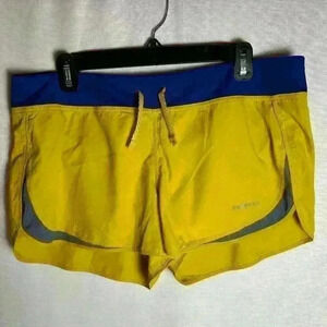 Patagonia women’s shorts, size L.  Blue and yellow with inner liner
